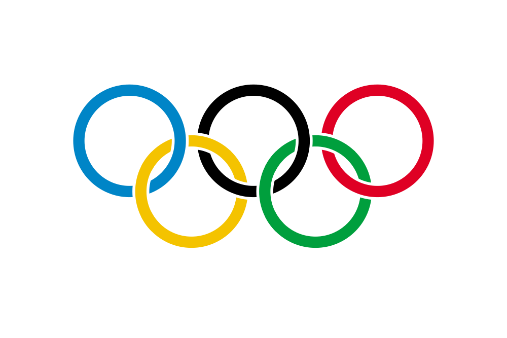 Auf dem Bild ist das Zeichen von den Olympischen Spielen. Es sind fünf Ringe. Jeder Ring hat eine andere Farbe. Blau, Schwarz, Rot, Gelb und Grün